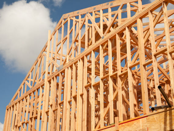 Abstract of New Home Construction Site Framing.